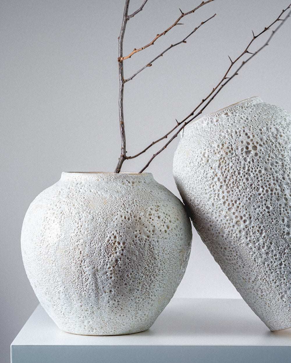 Cora - round, hand-finished sculptural vase by pluto. Dubai
