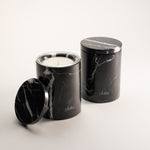 Black Marquina marble candle vessel close-up, refillable soy wax candle, pluto. Dubai