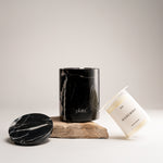 Black Marquina Marble Candle Set by pluto., hand-poured soy wax candle in natural Black Marquina marble vessel, Dubai