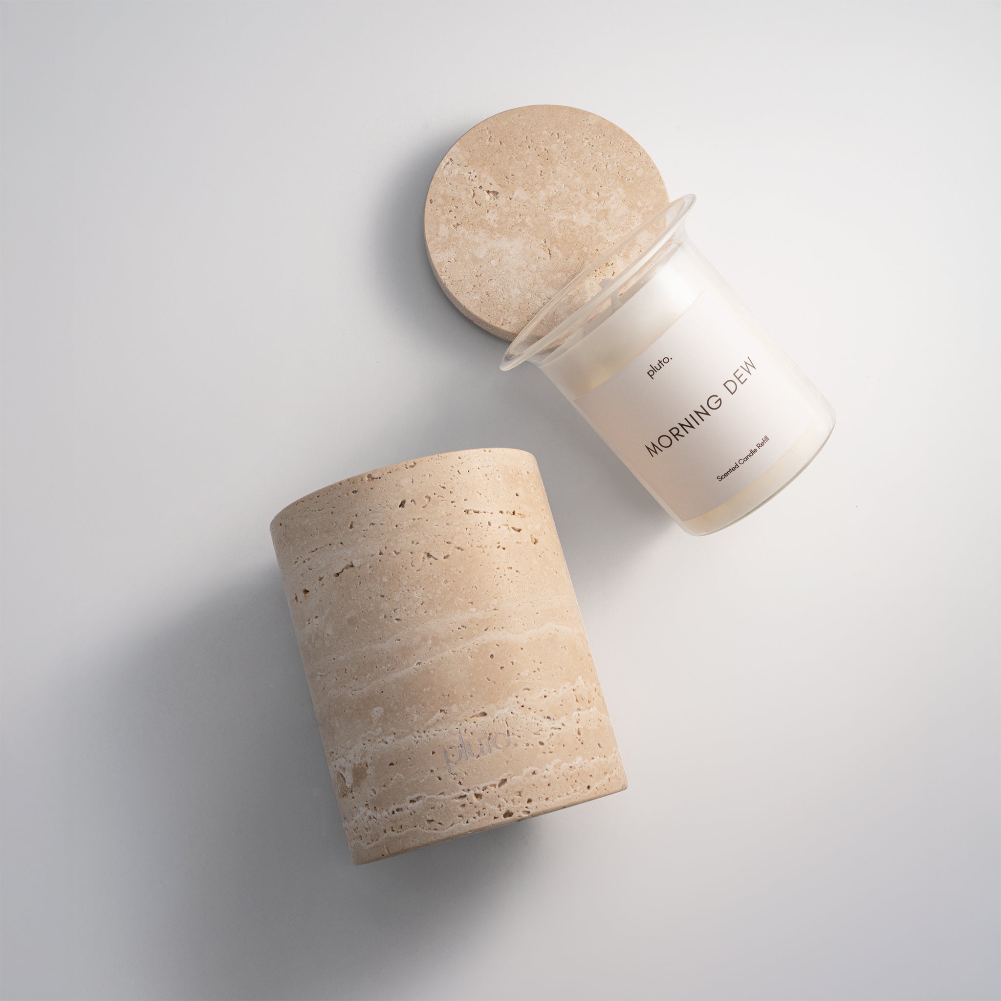 Travertine marble candle set by pluto., hand-poured soy wax candle in natural Travertine marble vessel, Dubai