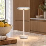 White cordless lamp on a marble kitchen island