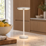 White cordless lamp on a marble kitchen island