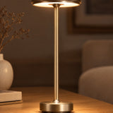 Gold cordless lamp warm downward glow detail