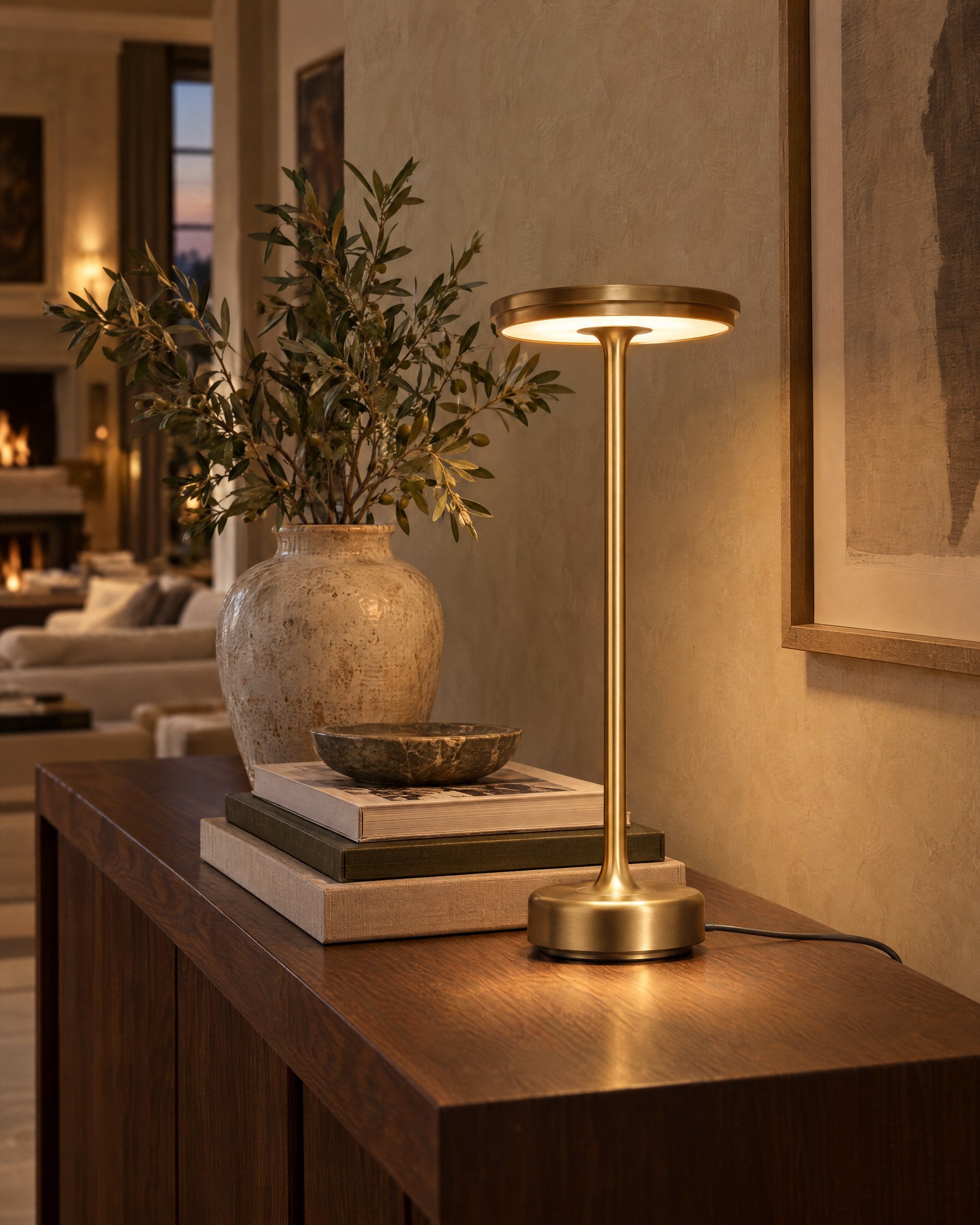 Gold XL table lamp on a long walnut console