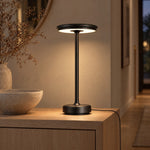 Black XL table lamp on a pale oak hallway console