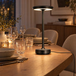 Black XL table lamp on an oak dining table