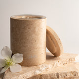 Travertine marble candle vessel close-up, refillable soy wax candle, pluto. Dubai