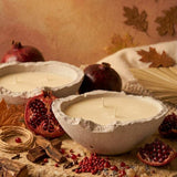 Velvet Pomegranate Eries bowl candles with pomegranates and autumn leaves